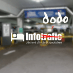 Logo Infotrafic détourné en « Infododo » devant un parking, poisson d'avril