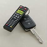Télécommande PlaceLibre et clé de voiture, poisson d'avril